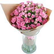 Bouquet of rose spray roses in paper