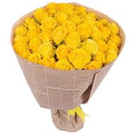 55 желтых роз в бумаге