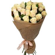 Cream roses in paper