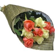 A small bouquet of white and orange roses