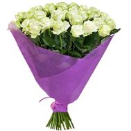 A bouquet of white roses in a package
