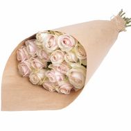 A bouquet of cream roses in craft