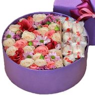 Flowers and Raffaello in a Round Box. Flowers and Raffaello in a Round Box