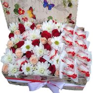 A box of flowers and Raffaello sweets