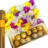 Box of chrysanthemums and ferrero