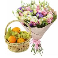 Fruit basket and a bouquet of natural flowers