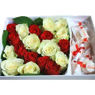 Red and white roses in a box of Raffaello