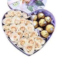 Cream roses and ferrero in a box