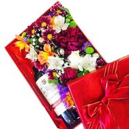 Flowers and wine in a box