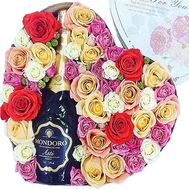 Box with flowers and champagne