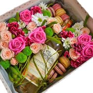 Box with flowers, wine and macarons