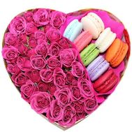 Pink spray roses and macaroni in a box heart