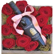 Roses with wine in a box