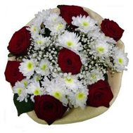 Bouquet of flowers from 4 chrysanthemums and 7 roses