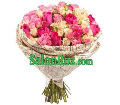 Bouquet of common and spray roses in paper Bouquet of common and spray roses in paper