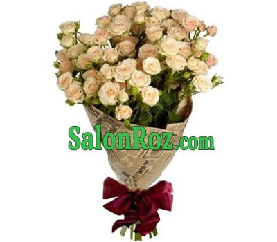 Cream spray roses in the newspaper Cream spray roses in the newspaper