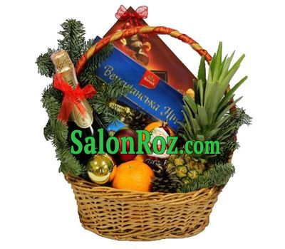 Christmas basket with fruits and sweets