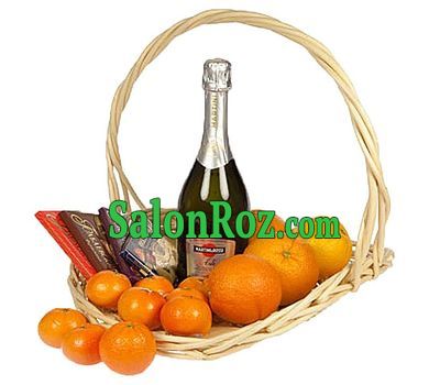 Champagne and fruits in a basket Champagne and fruits in a basket