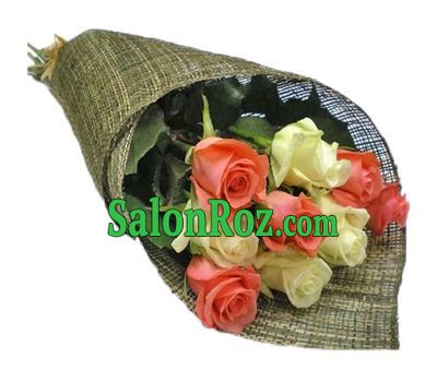 A small bouquet of white and orange roses A small bouquet of white and orange roses