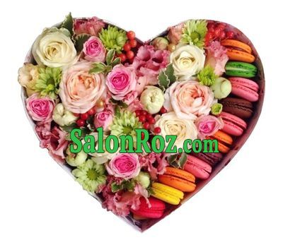 Flowers with macarons in a box in the shape of a heart Flowers with macarons in a box in the shape of a heart