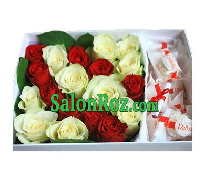 Red and white roses in a box of Raffaello Red and white roses in a box of Raffaello