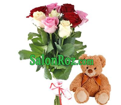 A small bouquet of roses and a bear A small bouquet of roses and a bear