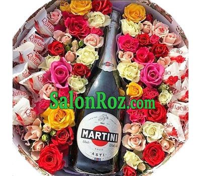 Flowers and champagne in a round box Flowers and champagne in a round box