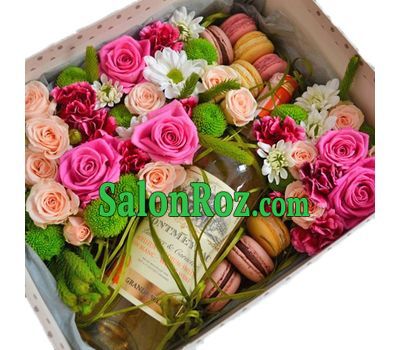 Box with flowers, wine and macarons Box with flowers, wine and macarons