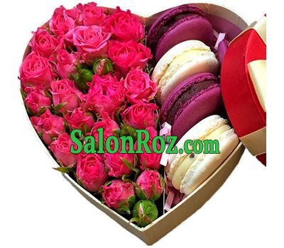 A small box of roses and macarons A small box of roses and macarons