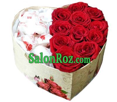 Red roses and candies in a box Red roses and candies in a box