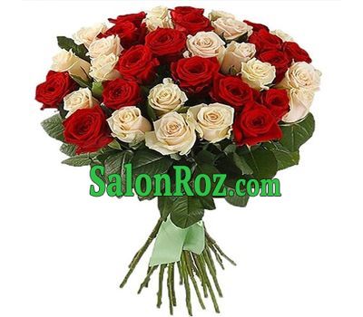 Mix of red and creamy roses Mix of red and creamy roses